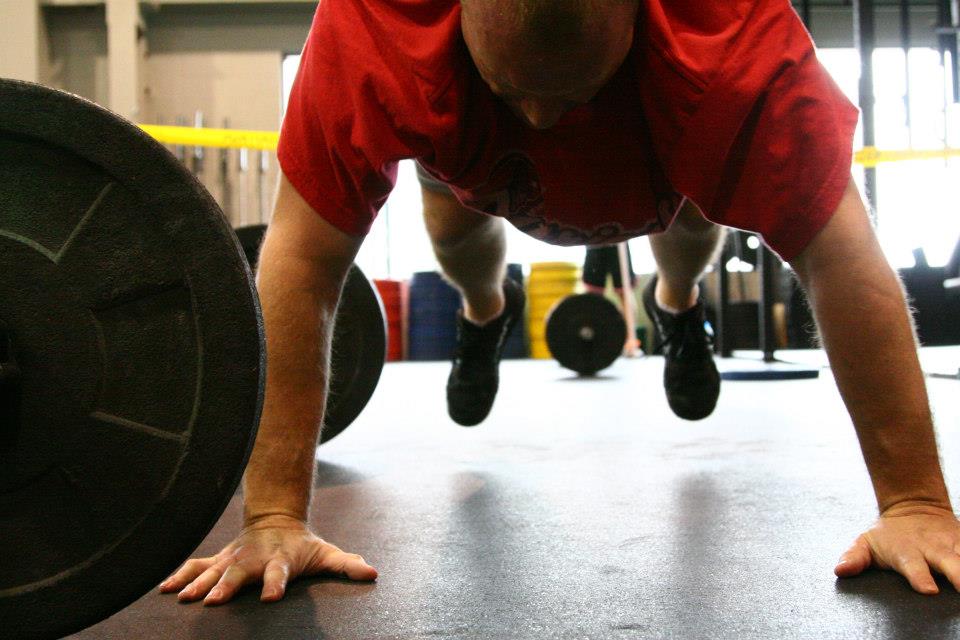 first responder athlete doing a burpee